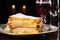 monte cristo sandwich served on a glass plate