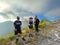 MONTE DI CAMBIO, ITALY - JULY 22, 2023: Portrait of happy hikers in the pathway to the Monte di Cambio