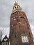 Montelbaans tower against a overcast sky . Amsterdam