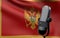 Montenegro flag with microphone 3d rendering image