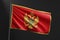 Montenegro flag national flag on black background.