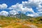 Montenegro, national park Durmitor, mountains and clouds panorama. Sunlight lanscape. Nature travel background.