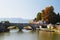 Montenegro, National Park Skadar Lake - September, 21 2018: A bridge in Virpazar village and small boats for rent with a beautiful