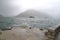 Montenegro port, wavy sea and foggy weather