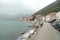 Montenegro port, wavy sea and misty weather. coastline