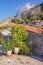 Montenegro. View of Old Town of Kotor. Red roofs and cozy yard