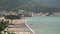 Montenegro. View from the sea on the beach of the town of Becici near Budva