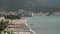 Montenegro. View from the sea on the beach of the town of Becici near Budva