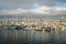 MONTEREY BAY, CALIFORNIA CIRCA  sailboats  in Monterey harbor with clouds and masts