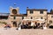 MONTERIGGIONI, 27 July 2022: The Main Piazza and the walls of the castle..