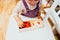 In montessori methodology, students learn mathematics using their hands with adapted materials, a girl learning game in class