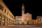 Montevarchi, Arezzo, Tuscany, Italy: night view of the main square Piazza Varchi with the ancient church Collegiata di San Lorenzo