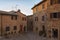 Montichiello - Italy, October 29, 2016: Quiet street in Montichiello, Tuscany with typical shuttered windows and paved streets