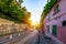 Montmartre district of Paris. Houses on narrow road in Montmartre district of Paris. View of cozy street in quarter Montmartre in