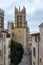 Montpellier, Occitanie, France - Rectangular tower of the Saint Peter church and a view over old town