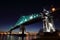 Montreal 375th anniversary. Jacques Cartier Bridge. Bridge panoramic colorful silhouette by night