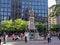 MONTREAL, CANADA - 06 24 2016: The Maisonneuve Monument in front of 500 Place d`Armes building in heart of Montreal. It