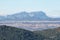 Montserrat multi-peaked mountain at background and towns in the surrounding area