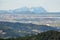 Montserrat multi-peaked mountain at background and towns in the surrounding area