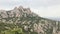 Montserrat, Spain, A large rocky mountains with Montserrat in the background