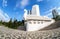 Monument Boat in the form of a white ship with sail at the city embankment