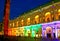 Monument called Basilica Palladiana with multi colored lights in