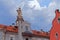 Monument in the central square in a small Alpine town Bruneck Brunico