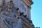 Monument covered with pigeons in Lisbon