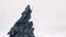 Monument of Empress on background cloudy sky. Action. Bottom view of majestic monument of russian Empress. Monument of