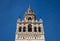 Monument of the giralda of seville in the gothic cathedral. It can be seen rising into the blue sky of the city. It is the largest