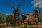 Monument Holguin, Cuba: statue of don Quixote on horse, Sancho Panza and mill