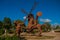 Monument Holguin, Cuba: statue of don Quixote on horse, Sancho Panza and mill