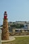 Monument With A Lantern With The Fishing Port To The Bottom In Tapia De Casariego. Nature, Travel, Recreation