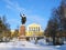 Monument for Lenin with luxury school background