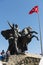 Monument of national rise Antalya with some people.