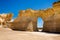 Monument Rock Chalk Formation with Natural Arch on a Sunny Day with Blue Sky