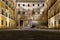 Monument Sallustio Bandini and Salimbeni palace on Piazza Salimbeni at night, Siena, Tuscany