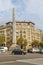 Monument in the shape of an obelisk of gray granite, Plaza Cinc d`Oros, Barcelona, Spain.