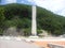 Monument of soyang dame with green mountains and bluse sky in the background