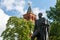 Monument to Emperor Alexander 1 on background of sky and the Komendantskaya Tower of Moscow Kremlin close-up