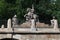 Monument to Jan III Sobieski with green trees on a sunny day at Lazienki Park in Warsaw, Poland