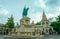 Monument to King Matthias against the background of the towers of the Fisherman`s Bastion in Budapest