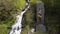 Monument to Prometheus near water fall in the national park of Borjomi, Georgia