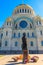 Monument to russian admiral Fyodor Ushakov in front of the Naval cathedral of St. Nicholas in Kronstadt, Russia