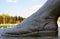 Monument to a student by Moscow State University. Detail - a leg in a shoe