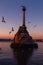 Monument to sunken ships in Black sea water on sunset. Sevastopol, Crimea