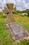 Monument and tombstone in a yard of ruined castle to a warrior hero of Bohdan Khmelnytsky rebellion