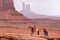 Monument Valley, Arizona - April 10, 2019 : A tourist about to have a picture taken on a horse at John Fordâ€™s Point