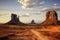 Monument valley landscape, cloudy sky at sunset sunrise. Navajo tribal park, United states of America, Utah, Arizona desert