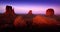 Monument Valley Landscape with Purple Skies andRed Rock Formations